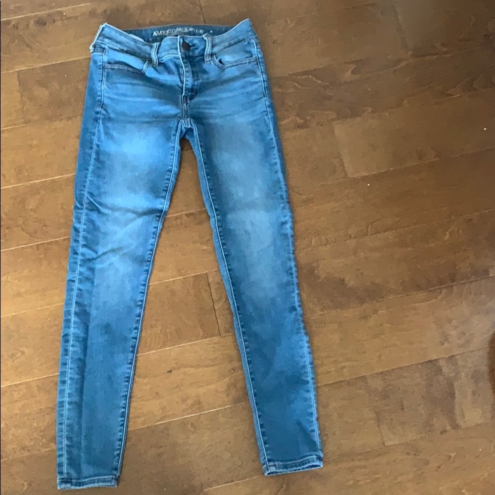Medium wash American Eagle skinny  jeans (2 reg)